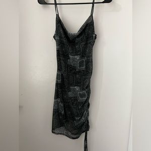 Two dresses! One mini one long. Both have glitter on them. Perfect for clubbing.